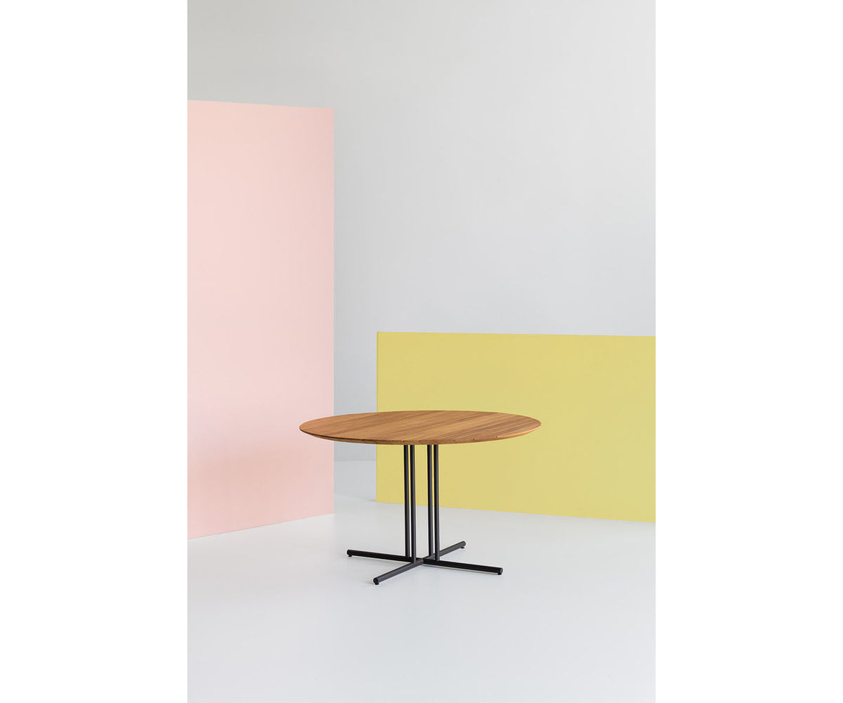 Round Graphic Outdoor Iroko Dining Table with Metal Base by Potocco | Casa Design Group