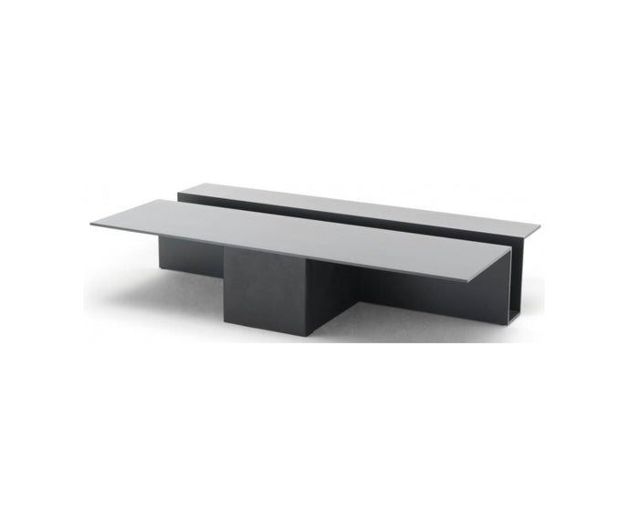 Grek Coffee Table by Living Divani featuring a sculptural design with an integrated magazine holder.