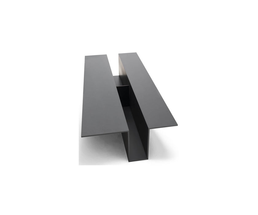 Grek Coffee Table by Living Divani featuring a sculptural design with an integrated magazine holder.