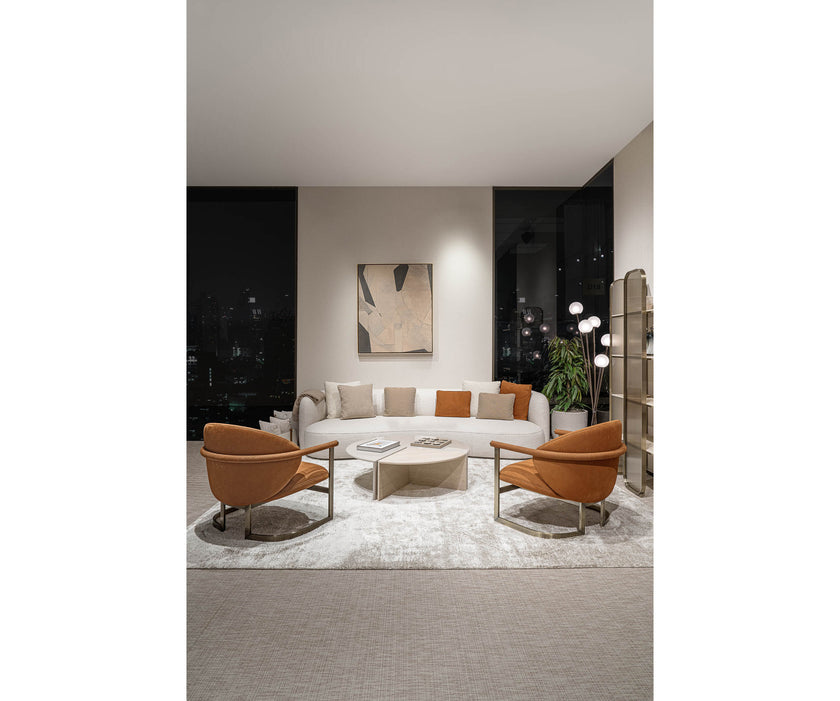Helena Coffee Table by Capital with a lacquered round top, marble insert, and metallic accents.