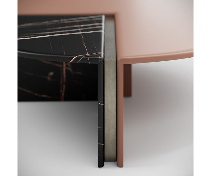 Helena Coffee Table by Capital with a lacquered round top, marble insert, and metallic accents.