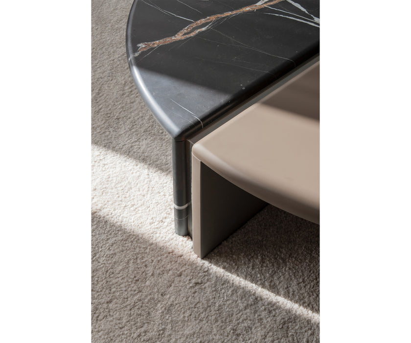 Helena Coffee Table by Capital with a lacquered round top, marble insert, and metallic accents.