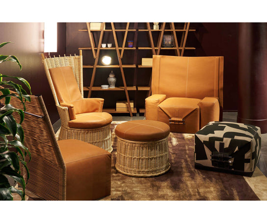 Hotte Lounge Chair by Cassina designed by Philippe Starck with a sculptural high back and upholstered seat.