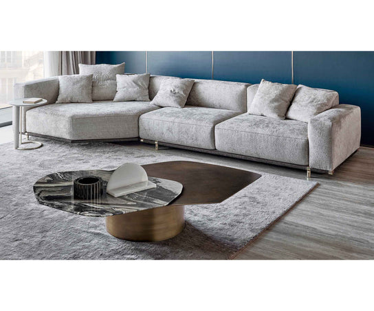 Incanto marble and metal coffee table by Rugiano with overlapping organic tops and a cylindrical base.
