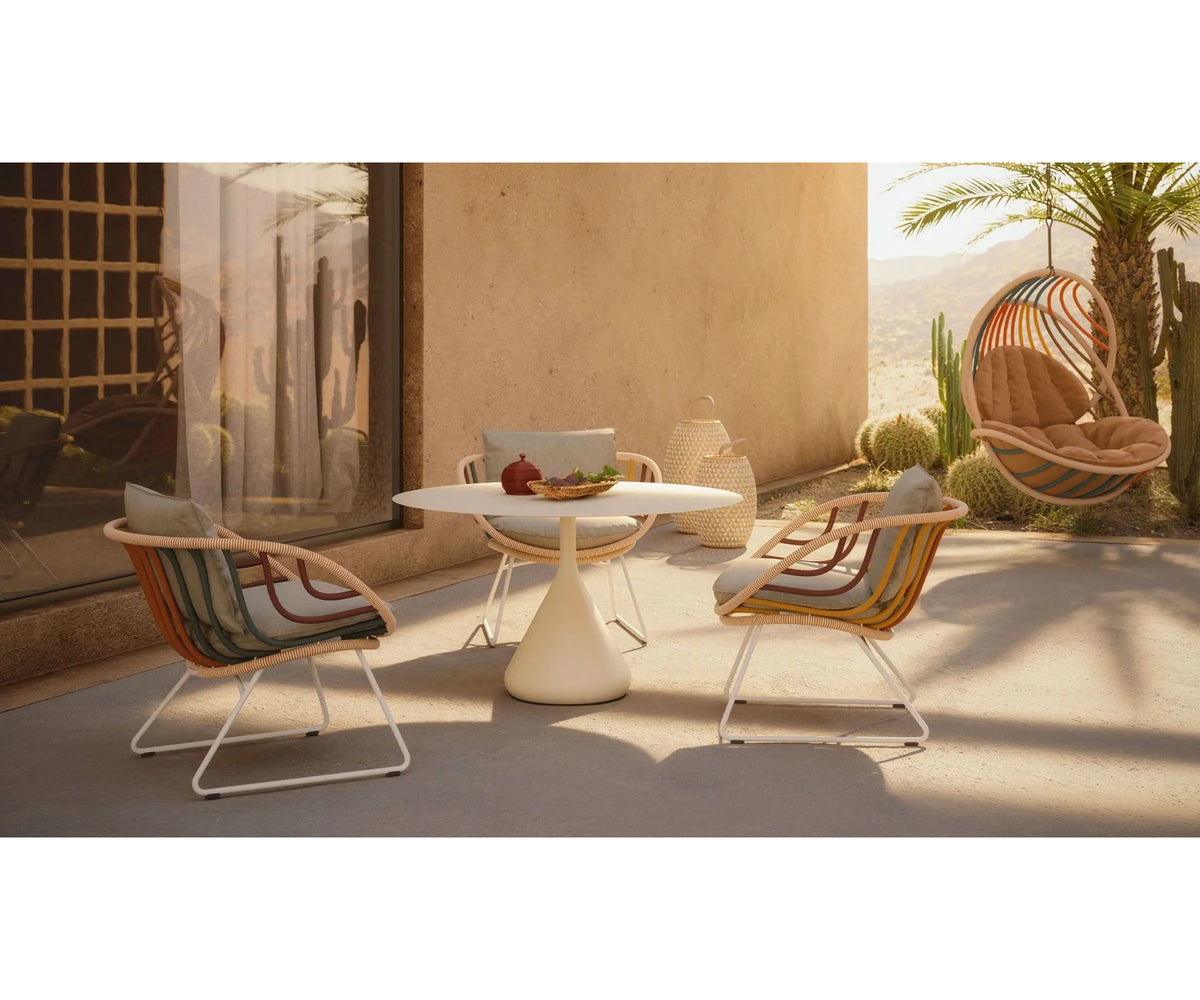 Luxury Kida Hanging Lounge Chair by Dedon | Airy Outdoor Design by Stephen Burks with Cradle-Like Form | Casa Design Group