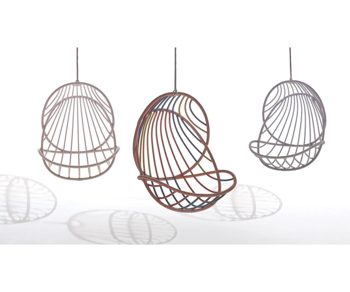 Luxury Kida Hanging Lounge Chair by Dedon | Airy Outdoor Design by Stephen Burks with Cradle-Like Form | Casa Design Group