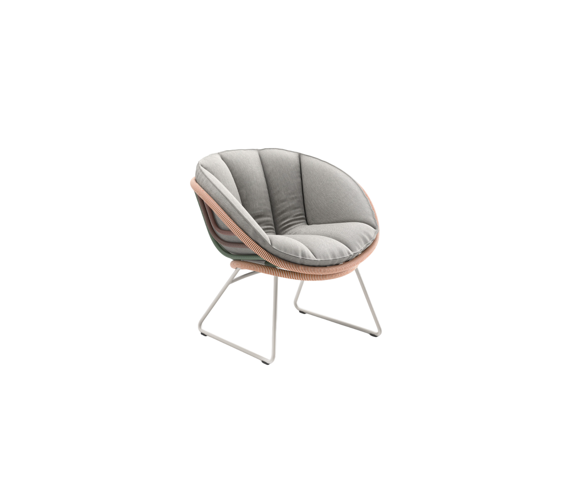 Kida Lounge Chair by Dedon with sculptural frame and striped Fiber wrap – Casa Design Group