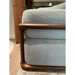 Klem floor sample sofa by Porada with Canaletta walnut frame and upholstered seating | Casa Design Group