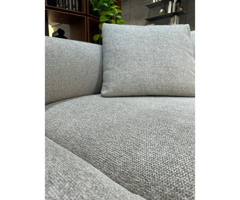 Klem floor sample sofa by Porada with Canaletta walnut frame and upholstered seating | Casa Design Group
