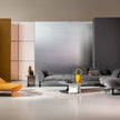 Kor Sculptural C Table with Natural Stone Top and Polished Steel Base by Baxter | Casa Design Group