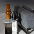 Kor Sculptural C Table with Natural Stone Top and Polished Steel Base by Baxter | Casa Design Group