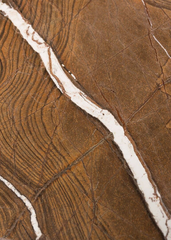 Kor Sculptural Coffee Table with Natural Stone Top and Polished Antiqued Steel Base by Baxter | Casa Design Group