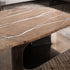 Kor Sculptural Coffee Table with Natural Stone Top and Polished Antiqued Steel Base by Baxter | Casa Design Group