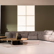 Kor Sculptural Coffee Table with Natural Stone Top and Polished Antiqued Steel Base by Baxter | Casa Design Group