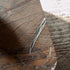 Kor Sculptural Side Table with Natural Stone Top and Polished Antiqued Steel Base by Baxter | Casa Design Group