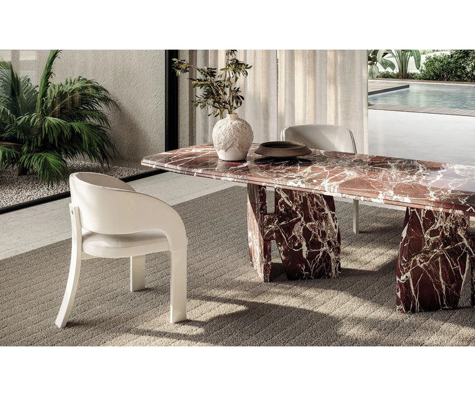 Frigerio Kumo Dining Table with sculptural marble base and refined contemporary design for luxury dining interiors Casa Design Group