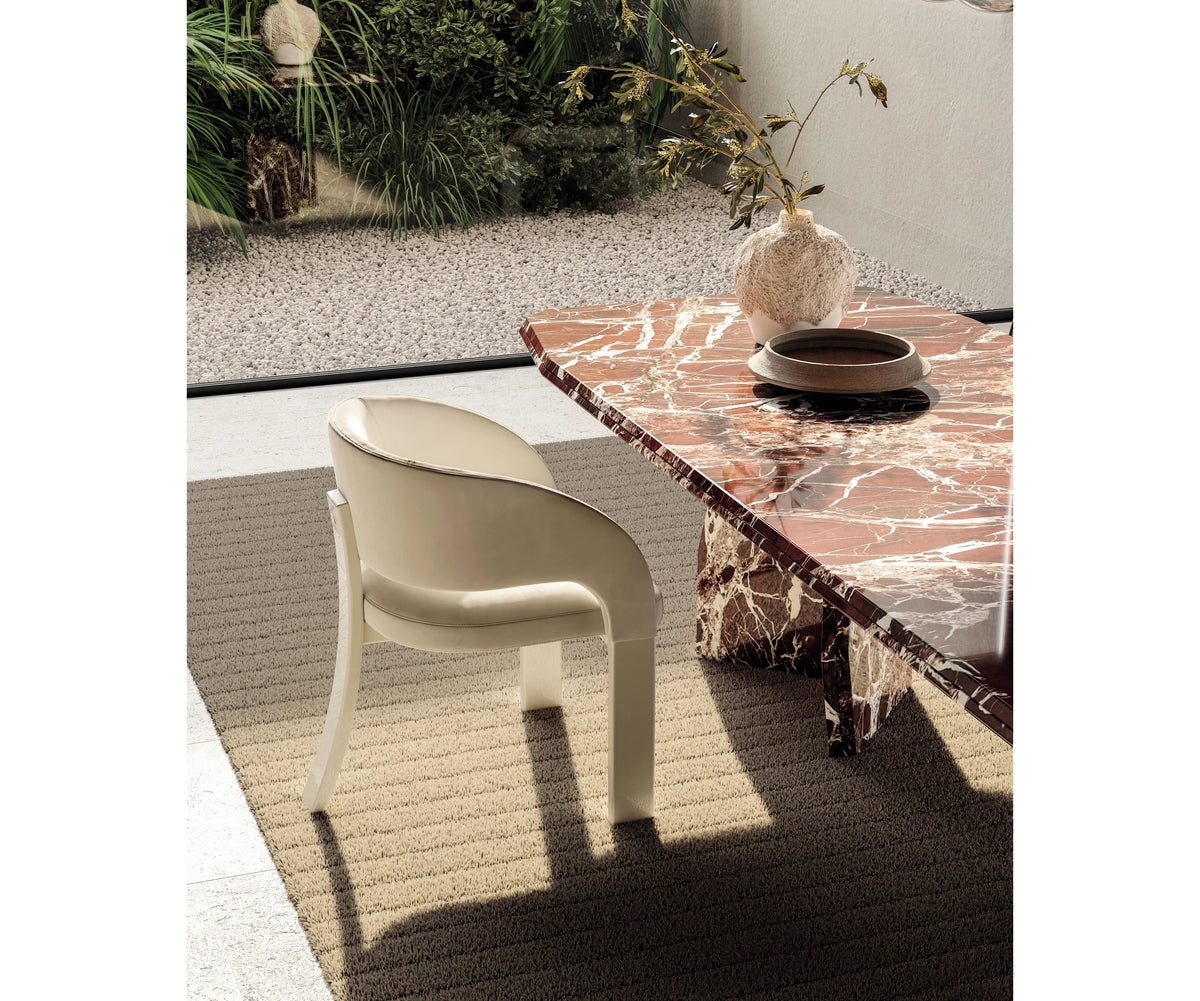 Frigerio Kumo Dining Table with sculptural marble base and refined contemporary design for luxury dining interiors Casa Design Group