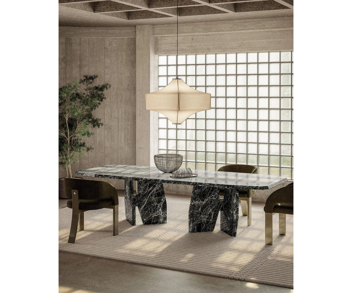 Frigerio Kumo Dining Table with sculptural marble base and refined contemporary design for luxury dining interiors Casa Design Group