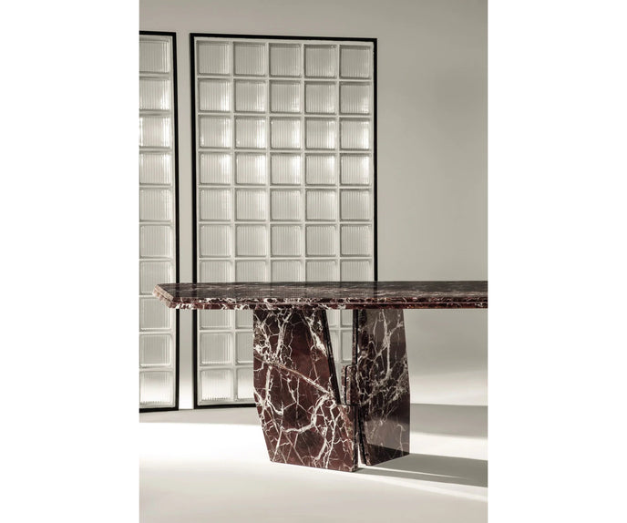 Frigerio Kumo Dining Table with sculptural marble base and refined contemporary design for luxury dining interiors Casa Design Group