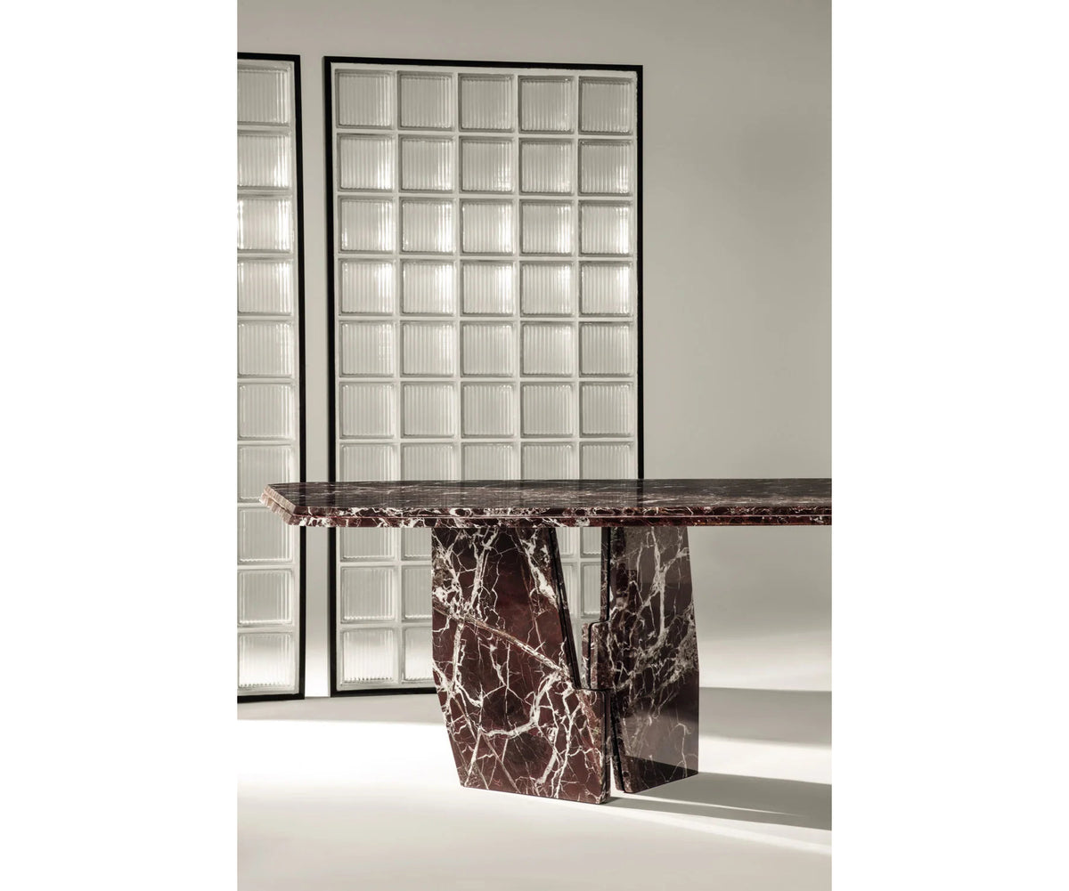 Frigerio Kumo Dining Table with sculptural marble base and refined contemporary design for luxury dining interiors Casa Design Group