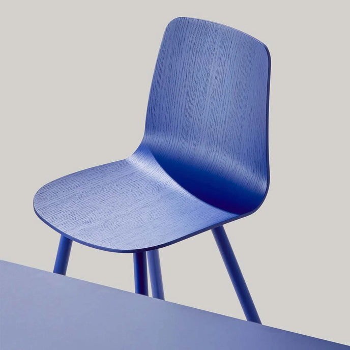 Kuskoa M Dining Chair with curved oak veneer shell and slender powder-coated steel frame by Alki | Casa Design Group