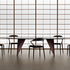 Lambda Dining Table with sculptural folded base and elegant contemporary finishes by Rimadesio | Casa Design Group