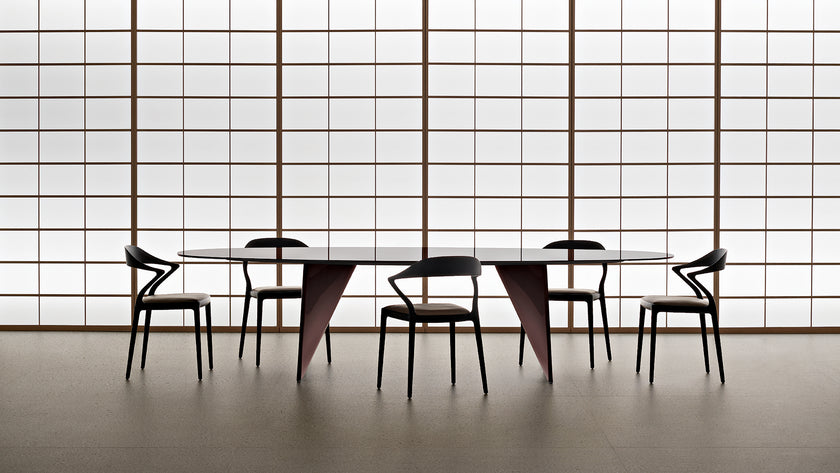 Lambda Dining Table with sculptural folded base and elegant contemporary finishes by Rimadesio | Casa Design Group