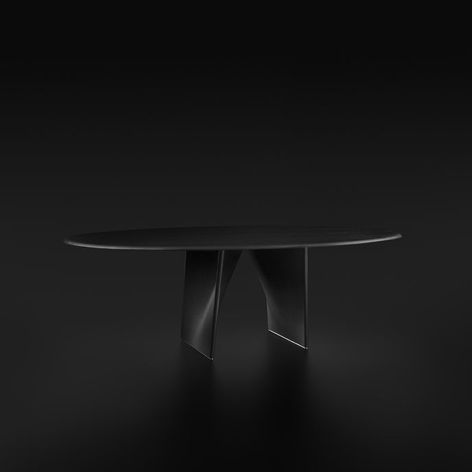 Lambda Dining Table with sculptural folded base and elegant contemporary finishes by Rimadesio | Casa Design Group