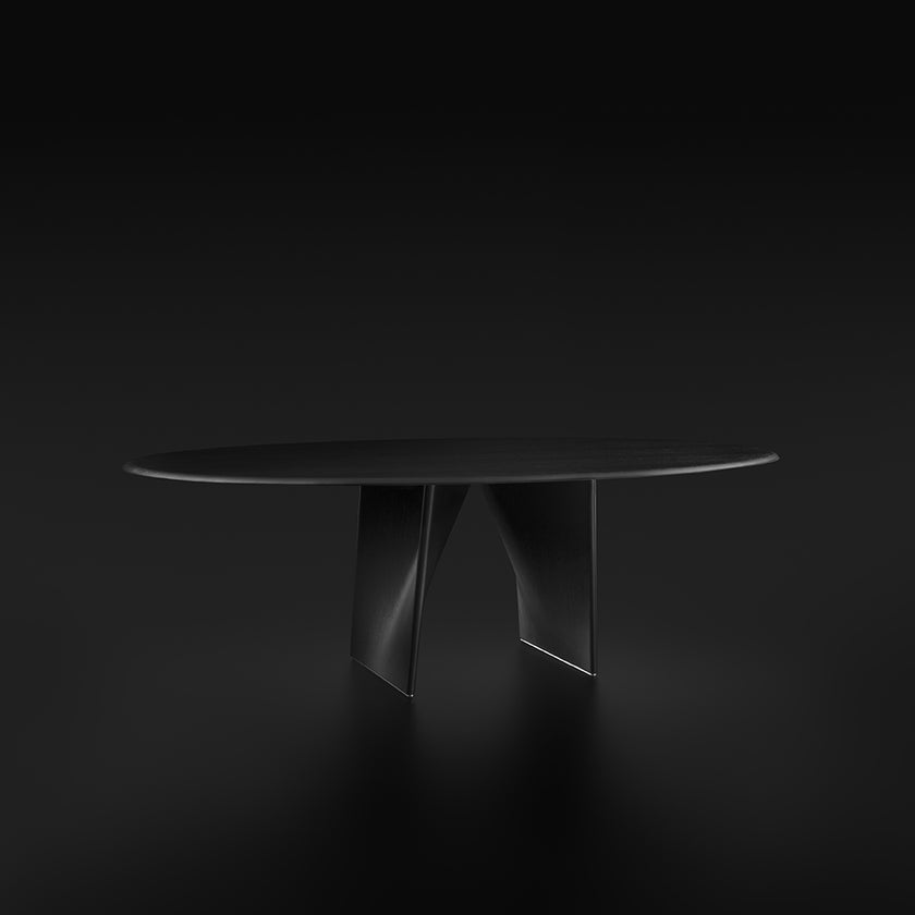 Lambda Dining Table with sculptural folded base and elegant contemporary finishes by Rimadesio | Casa Design Group