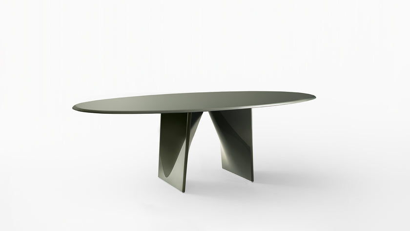 Lambda Dining Table with sculptural folded base and elegant contemporary finishes by Rimadesio | Casa Design Group