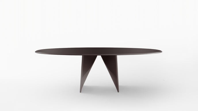 Lambda Dining Table with sculptural folded base and elegant contemporary finishes by Rimadesio | Casa Design Group