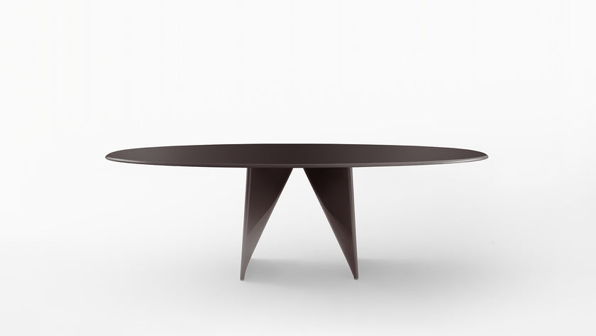 Lambda Dining Table with sculptural folded base and elegant contemporary finishes by Rimadesio | Casa Design Group