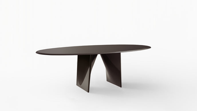 Lambda Dining Table with sculptural folded base and elegant contemporary finishes by Rimadesio | Casa Design Group