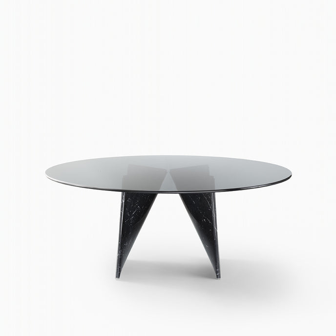 Lambda Dining Table with sculptural folded base and elegant contemporary finishes by Rimadesio | Casa Design Group