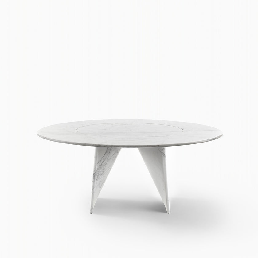 Lambda Dining Table with sculptural folded base and elegant contemporary finishes by Rimadesio | Casa Design Group