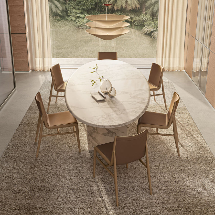 Lambda Dining Table with sculptural folded base and elegant contemporary finishes by Rimadesio | Casa Design Group