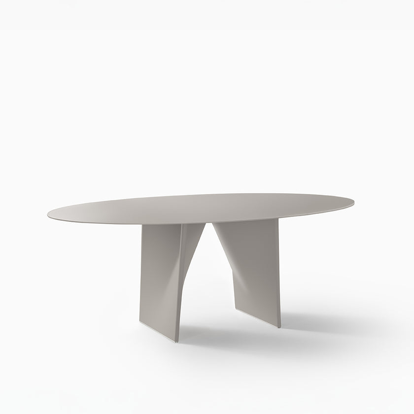 Lambda Dining Table with sculptural folded base and elegant contemporary finishes by Rimadesio | Casa Design Group