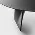 Lambda Dining Table with sculptural folded base and elegant contemporary finishes by Rimadesio | Casa Design Group