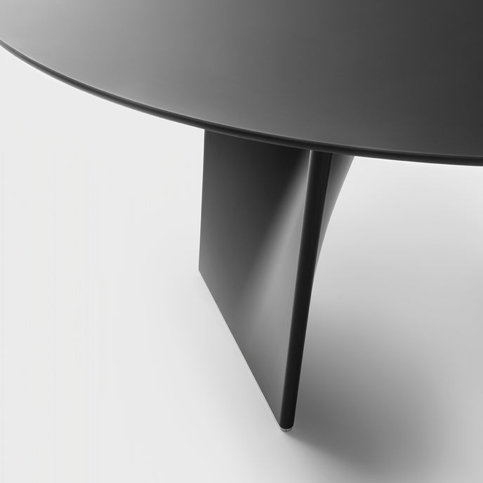 Lambda Dining Table with sculptural folded base and elegant contemporary finishes by Rimadesio | Casa Design Group