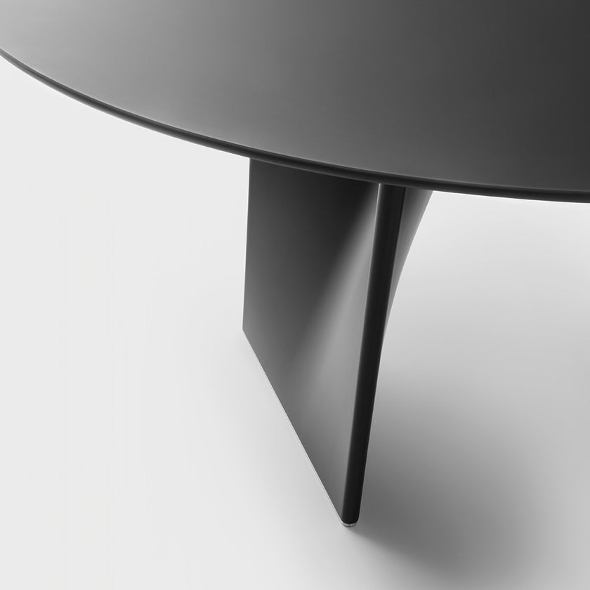Lambda Dining Table with sculptural folded base and elegant contemporary finishes by Rimadesio | Casa Design Group