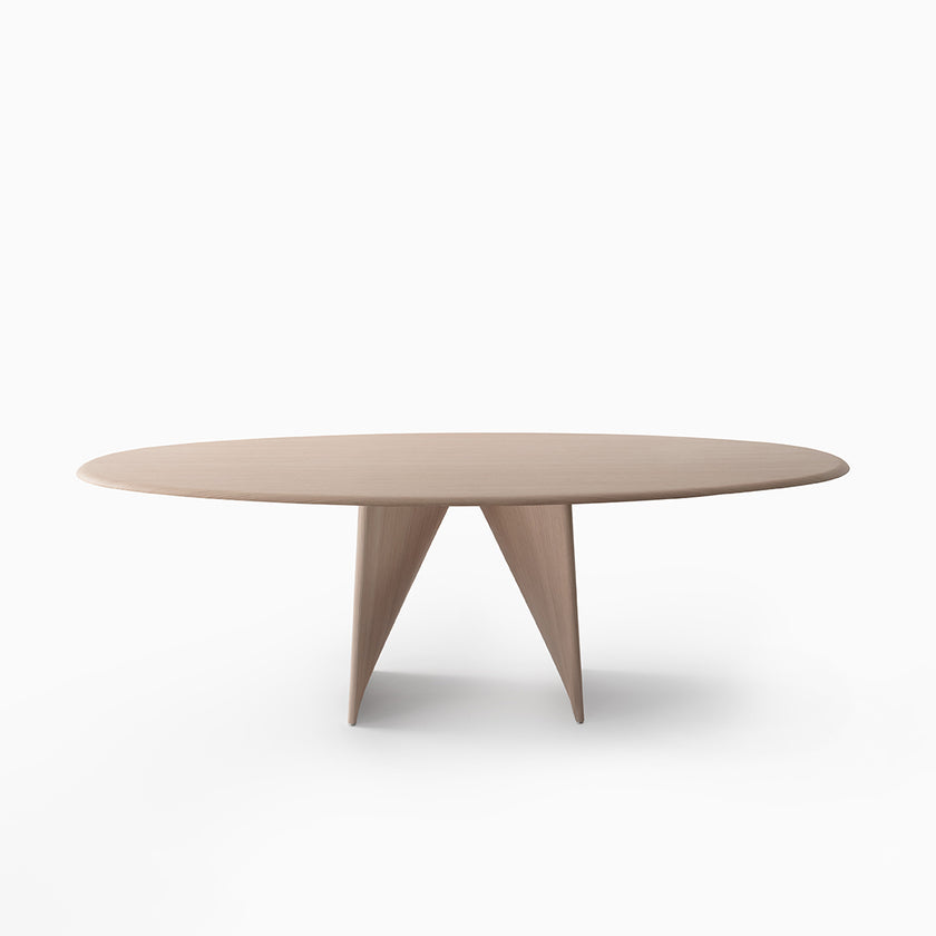 Lambda Dining Table with sculptural folded base and elegant contemporary finishes by Rimadesio | Casa Design Group