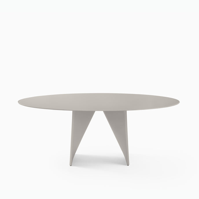 Lambda Dining Table with sculptural folded base and elegant contemporary finishes by Rimadesio | Casa Design Group