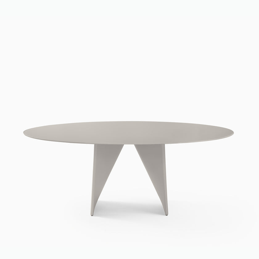 Lambda Dining Table with sculptural folded base and elegant contemporary finishes by Rimadesio | Casa Design Group