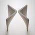 Lambda Dining Table with sculptural folded base and elegant contemporary finishes by Rimadesio | Casa Design Group