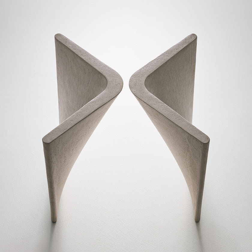 Lambda Dining Table with sculptural folded base and elegant contemporary finishes by Rimadesio | Casa Design Group