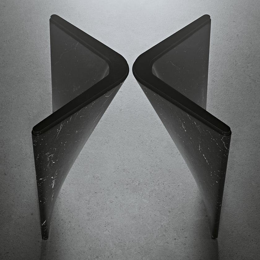 Lambda Dining Table with sculptural folded base and elegant contemporary finishes by Rimadesio | Casa Design Group