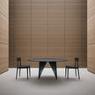 Lambda Dining Table with sculptural folded base and elegant contemporary finishes by Rimadesio | Casa Design Group