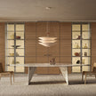 Lambda Dining Table with sculptural folded base and elegant contemporary finishes by Rimadesio | Casa Design Group
