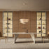 Lambda Dining Table with sculptural folded base and elegant contemporary finishes by Rimadesio | Casa Design Group