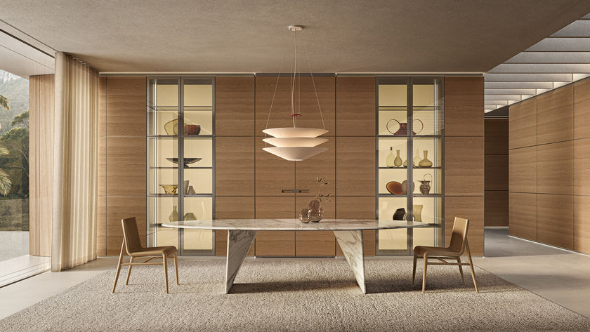 Lambda Dining Table with sculptural folded base and elegant contemporary finishes by Rimadesio | Casa Design Group